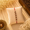 Five Rudraksh with Balls Silver Rakhi