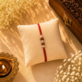 Two Rudraksh with Balls Silver Rakhi