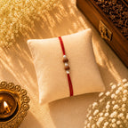Two Rudraksh with Balls Silver Rakhi